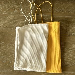 2 crop tops or bralettes